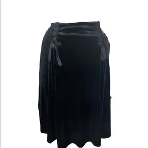 Black skirt, suede fabric with bow ties on both sides of the waists line!